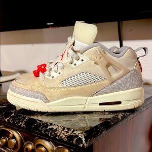 Stylish Cream and Gray Jordan Sneakers with Red Accents